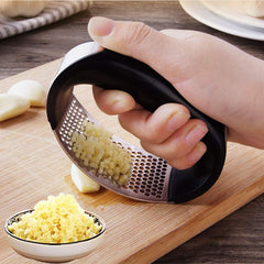 Unleash Flavorful Feats with the Ultimate Garlic Press